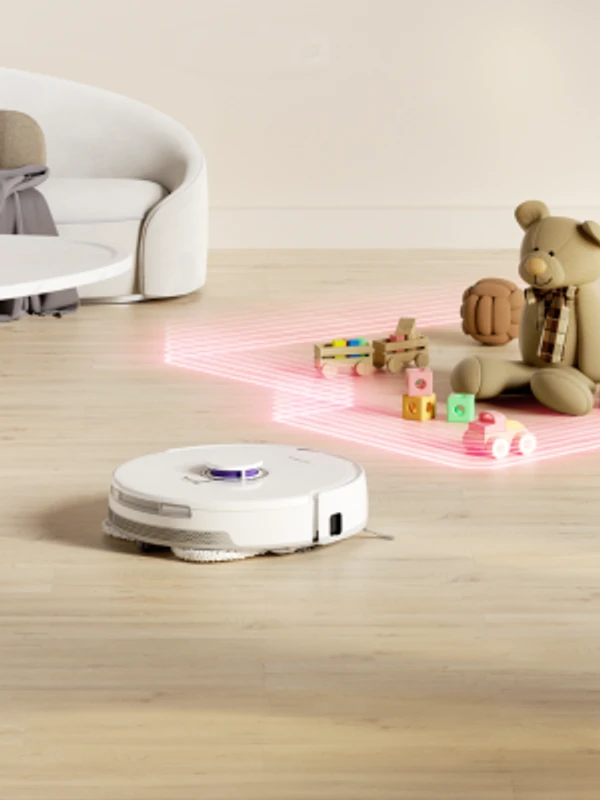 Narwal Freo robot vacuum docked at its base station